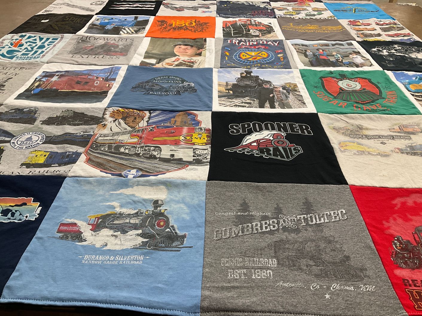 T-shirt quilt with trains, railroads themes by Conni from AZ