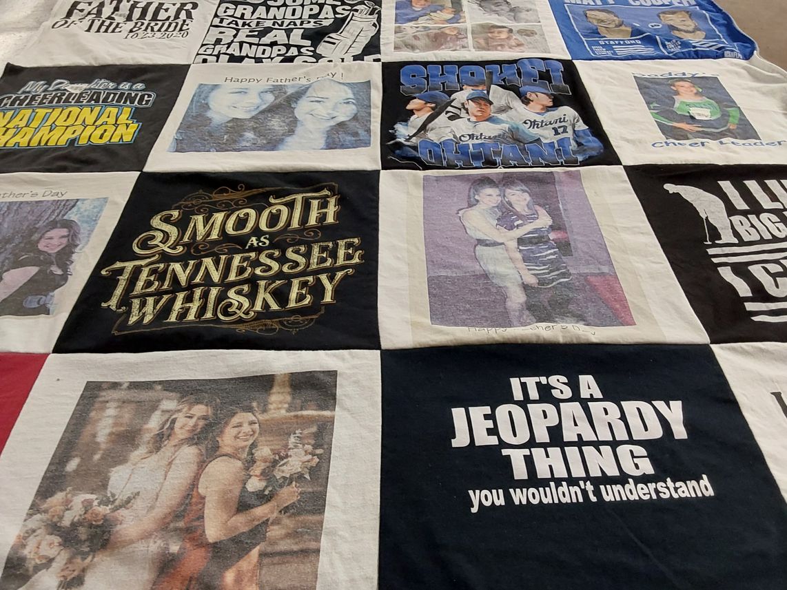 T-shirt quilt with family, celebration themes by Claudia from CA