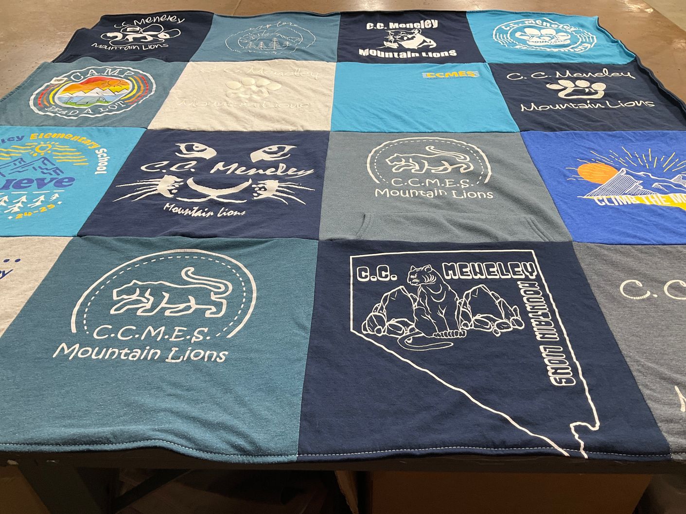 T-shirt quilt featuring mountain lions by Alicia from NV