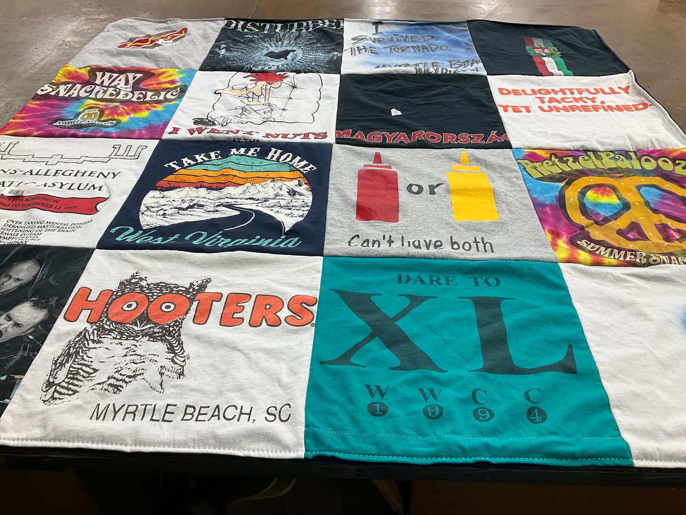 T-shirt quilt with music, travel themes by Dorothy from WV