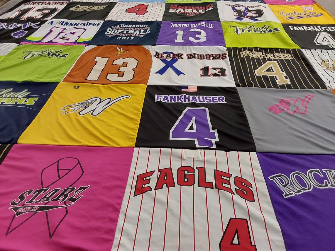 T-shirt quilt featuring lady titans, black widows by Robert from VA