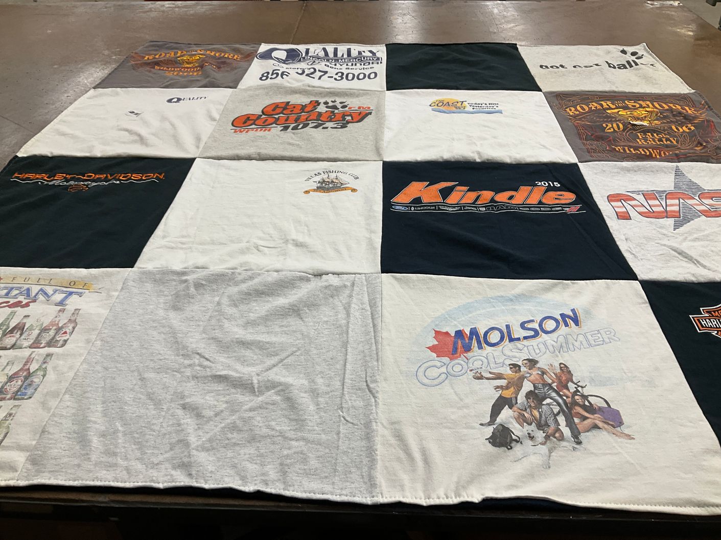 T-shirt quilt with motorcycles, music themes by Sarah from NJ