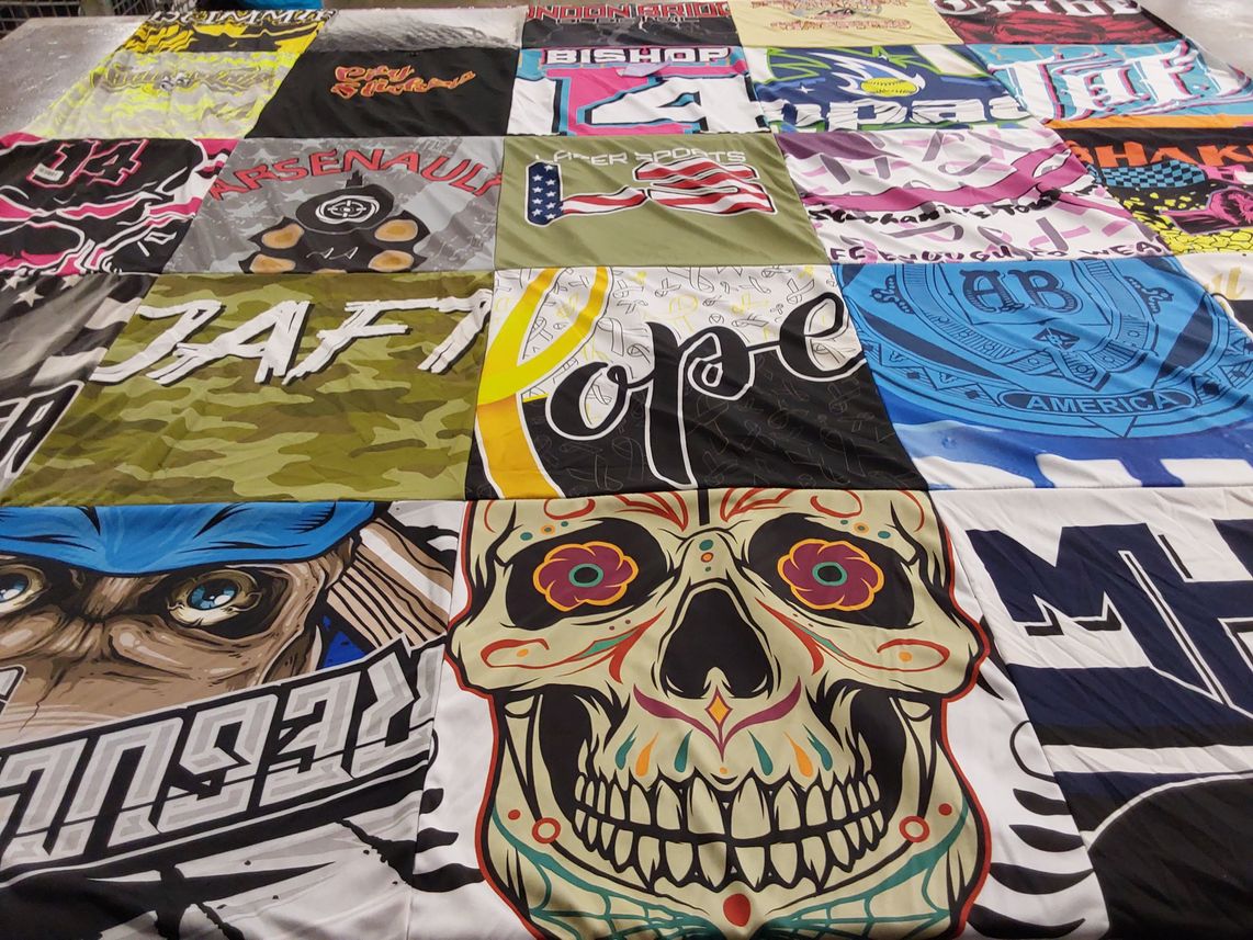 T-shirt quilt with art, music themes by Windy from AZ