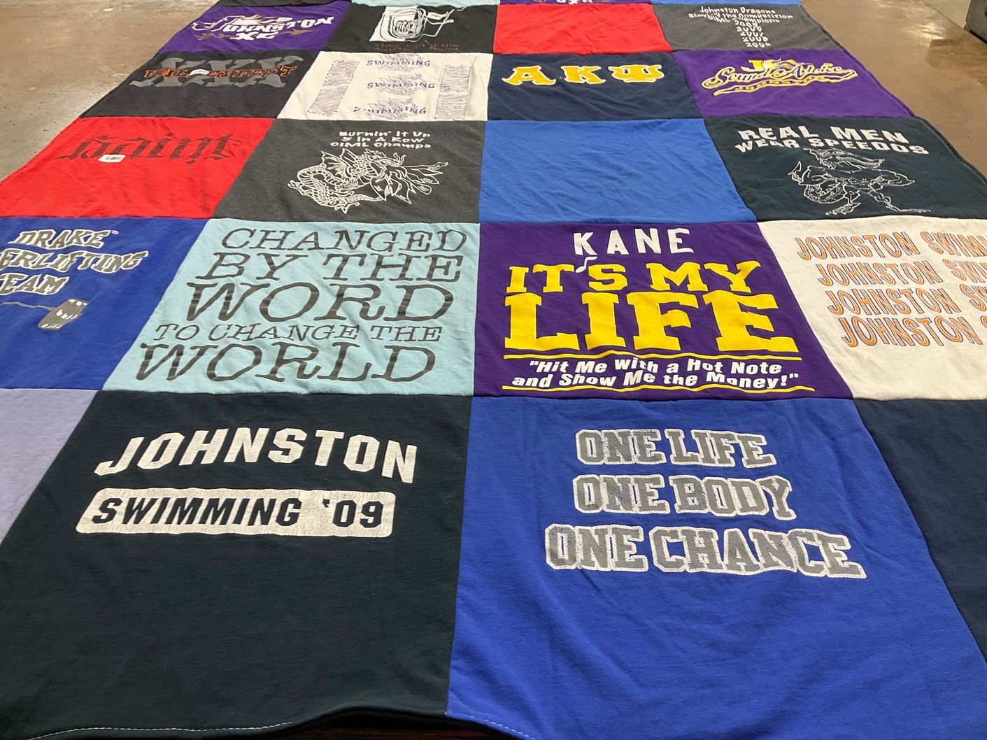T-shirt quilt featuring johnston swimming team by Michele from IA