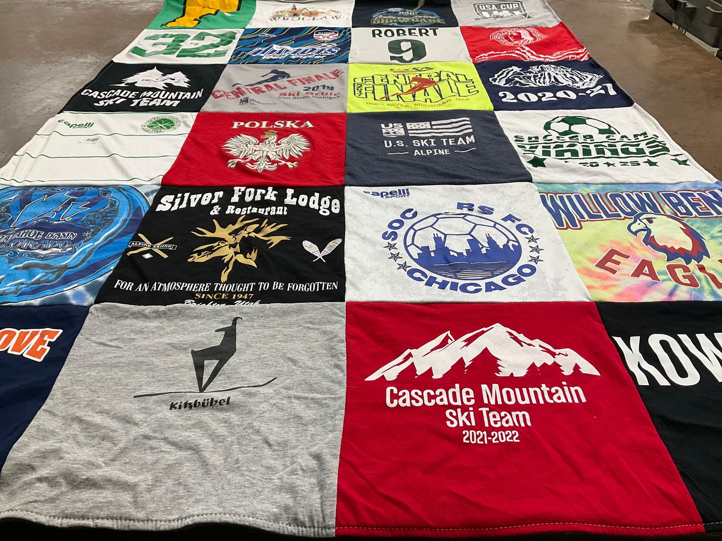 T-shirt quilt with skiing, soccer themes by Patrycja from IL