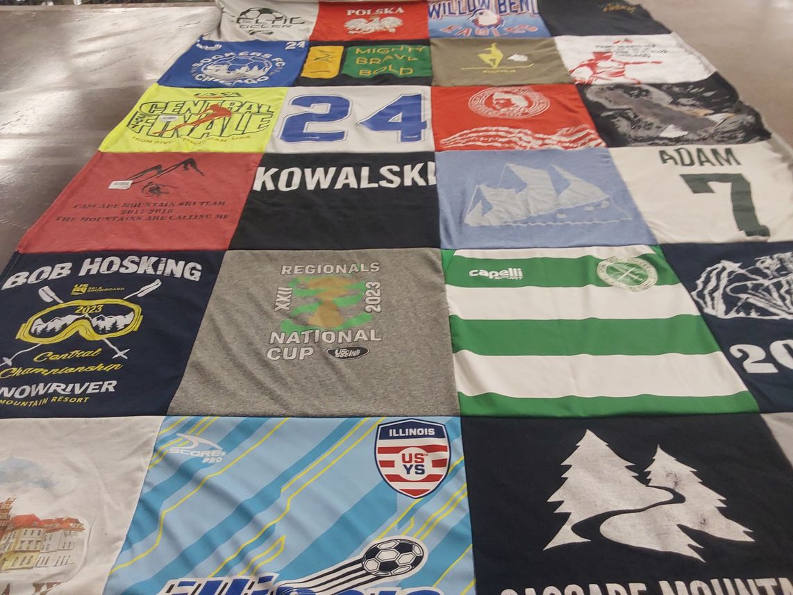 T-shirt quilt with sports, mountain themes by Patrycja from IL