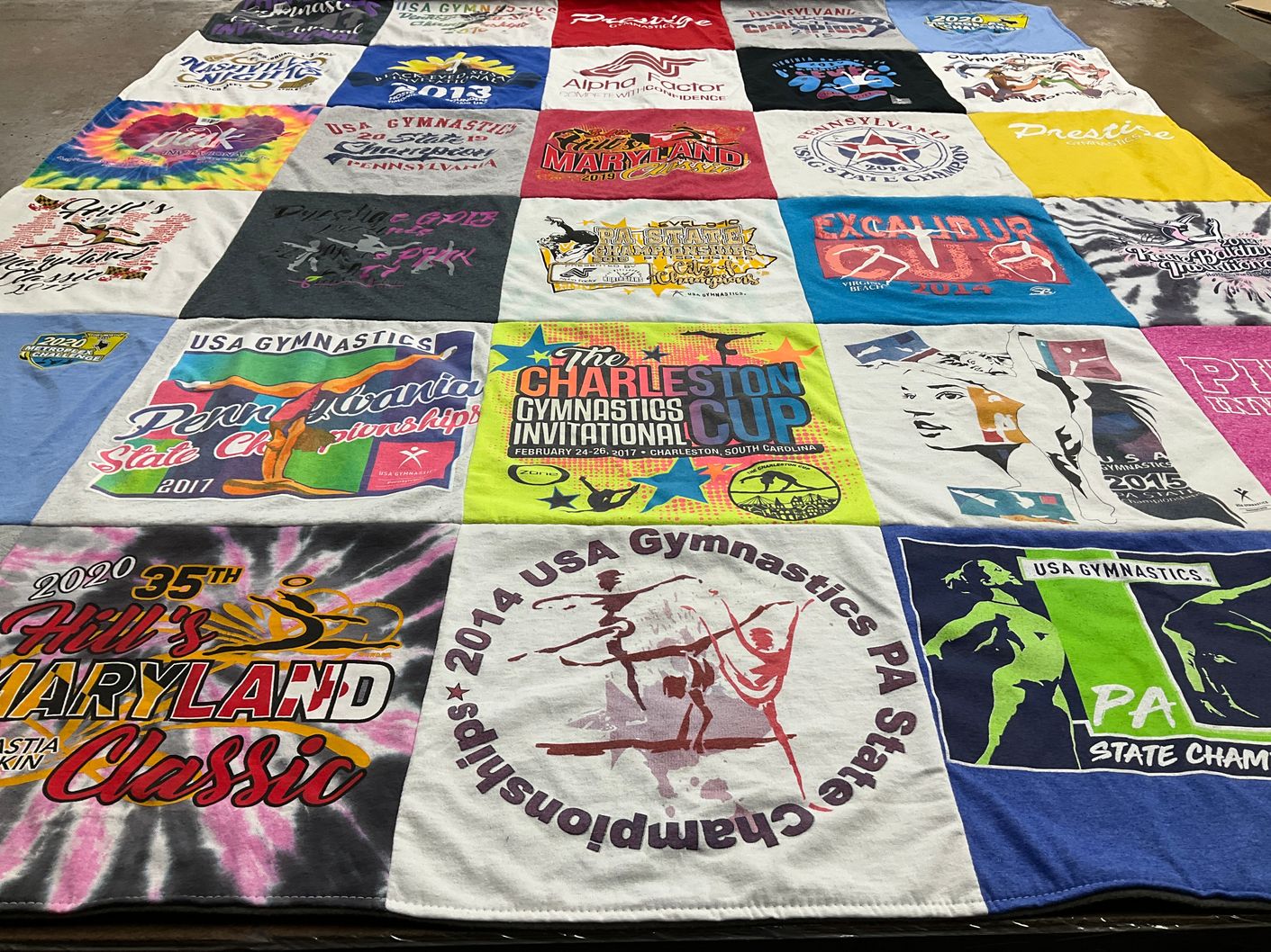 T-shirt quilt with gymnastics, sports themes by Debbie from PA