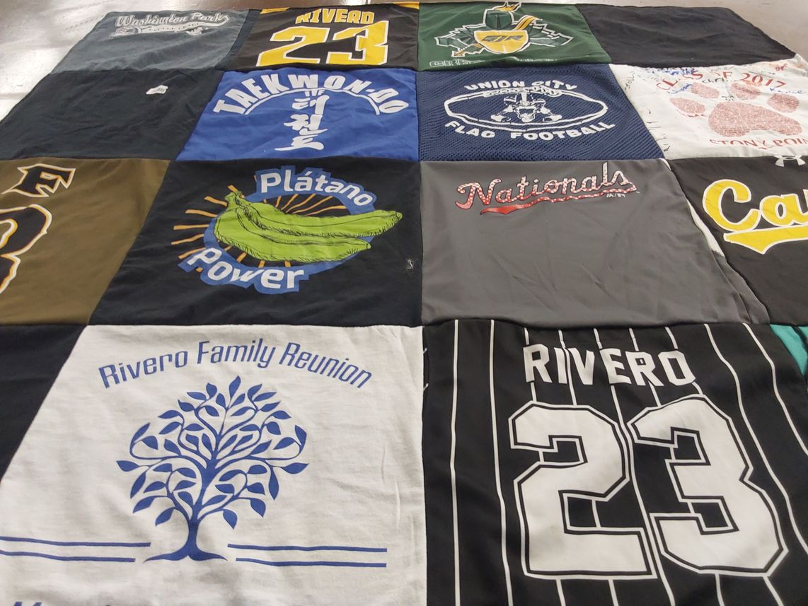 T-shirt quilt with family gatherings, sports themes by Jorge from NY