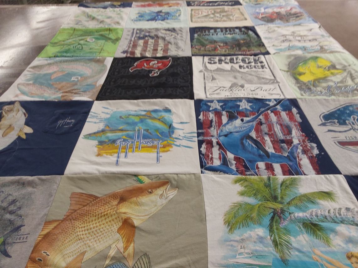 T-shirt quilt with fishing, marine life themes by Margaret from FL