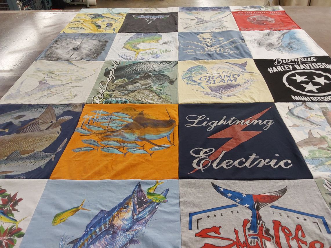 T-shirt quilt with fishing, motorcycling themes by Margaret from FL