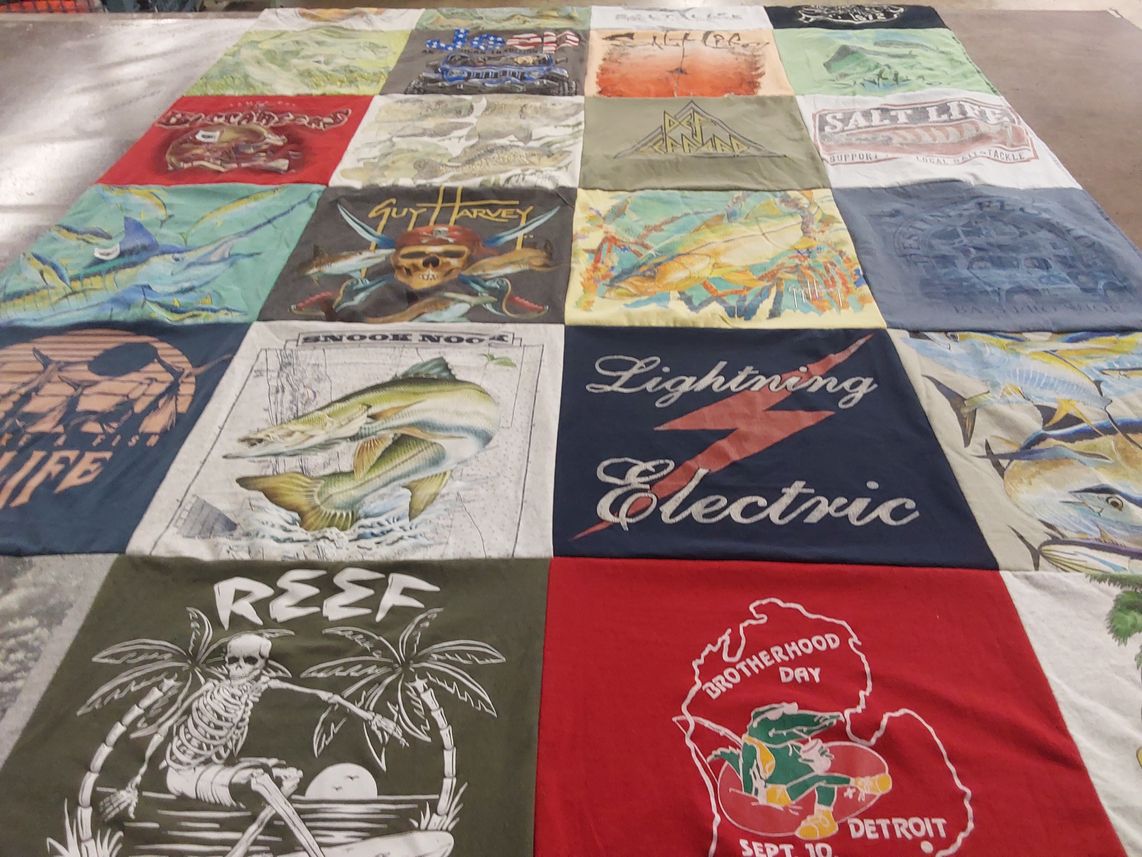 T-shirt quilt with fishing, outdoors themes by Margaret from FL