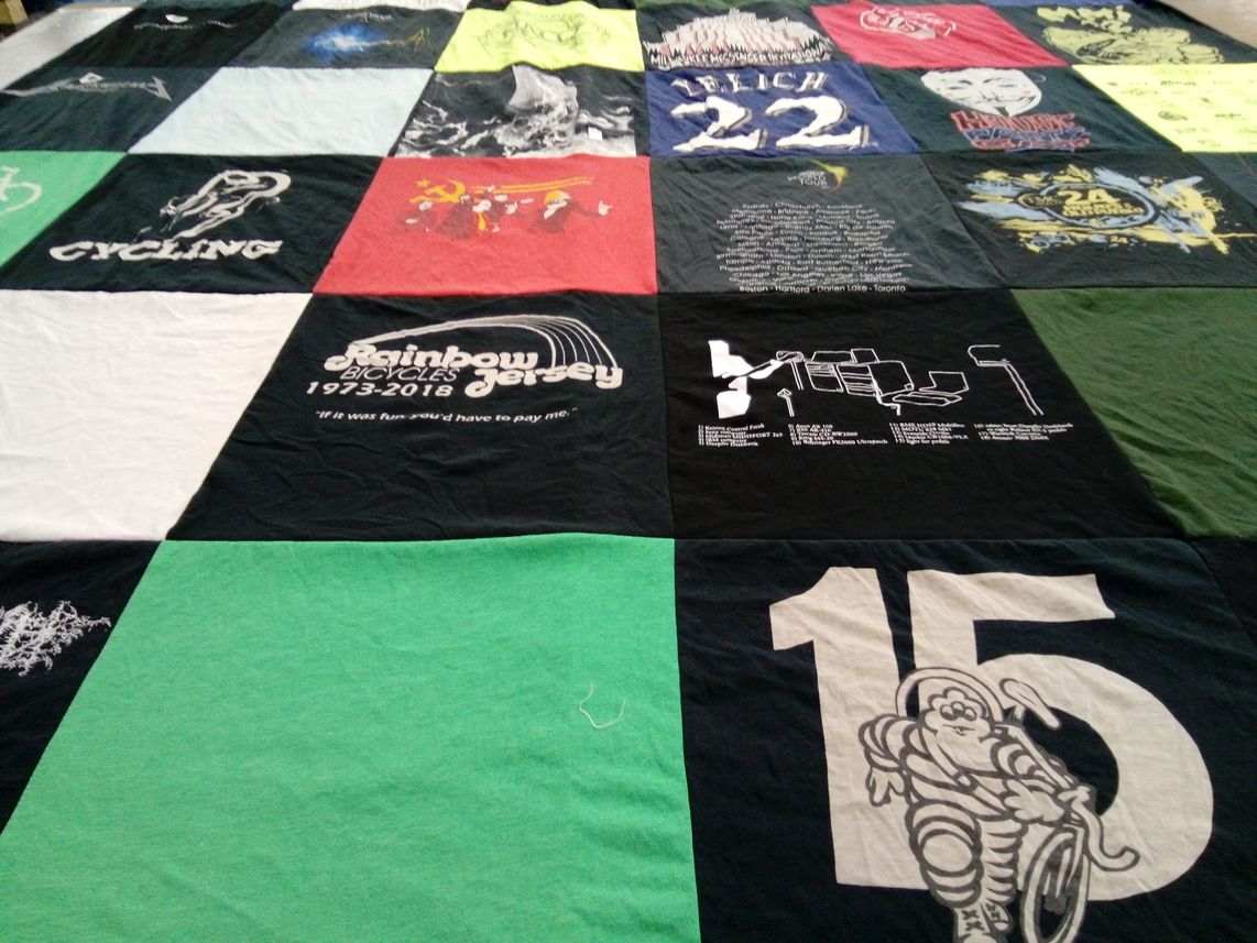 T-shirt quilt with cycling themes by Ryan from AZ