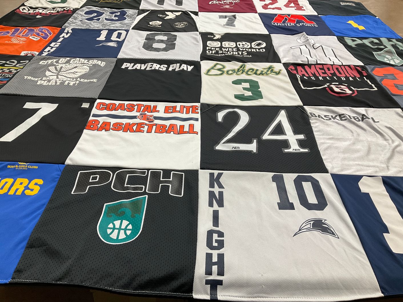 T-shirt quilt featuring knight, bobcats by Katie from CA