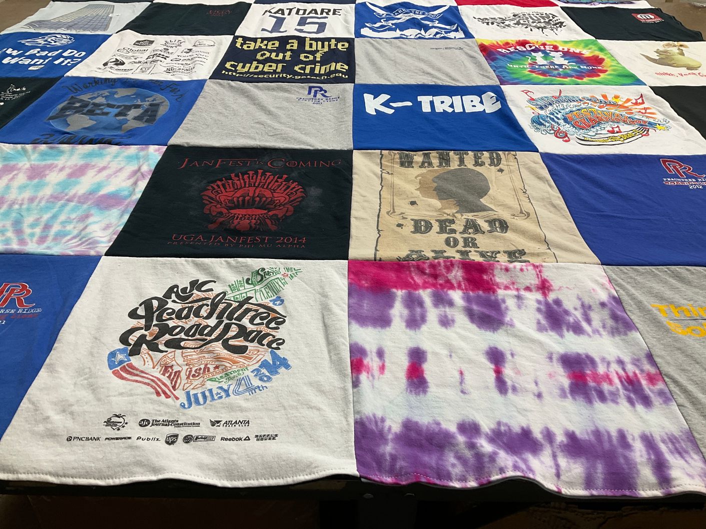 T-shirt quilt with music, events themes by Veena from GA