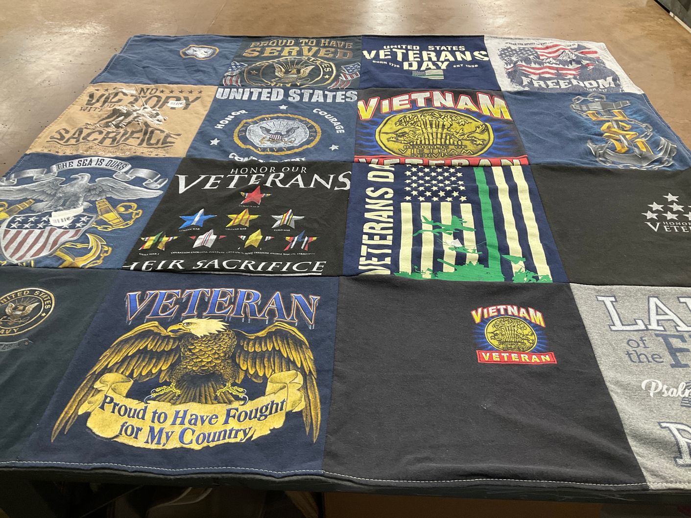 T-shirt quilt with military, veterans themes by Kathy from TX