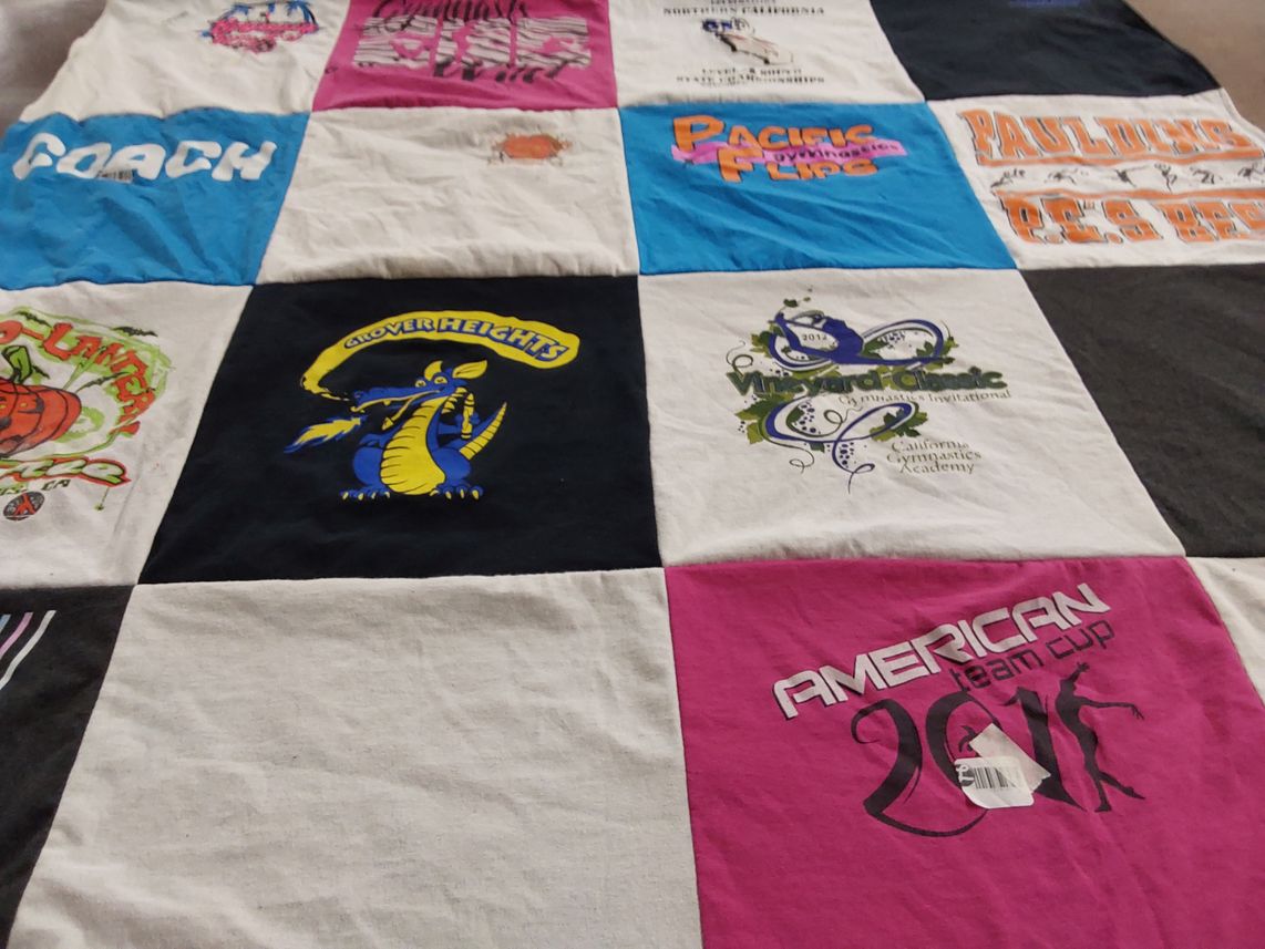 T-shirt quilt with gymnastics themes by Stacey from CA