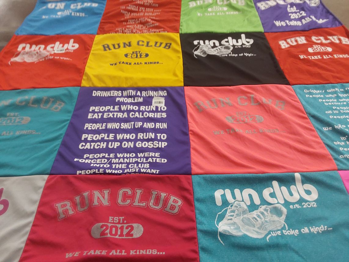 T-shirt quilt with running themes by Kathleen from OH