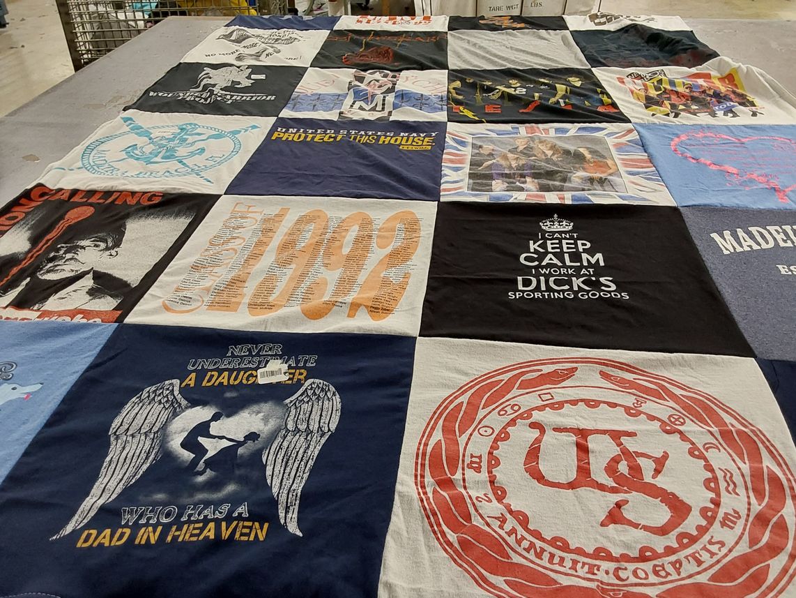 T-shirt quilt with military, family themes by Michelle from IA