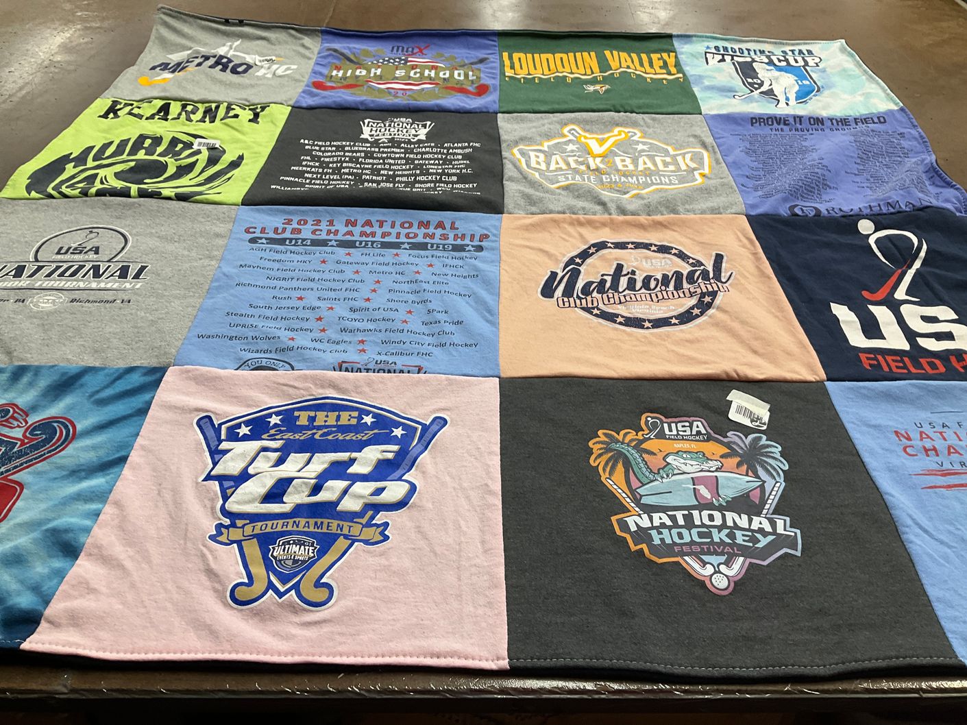 T-shirt quilt with hockey, sports themes by Shannon from VA
