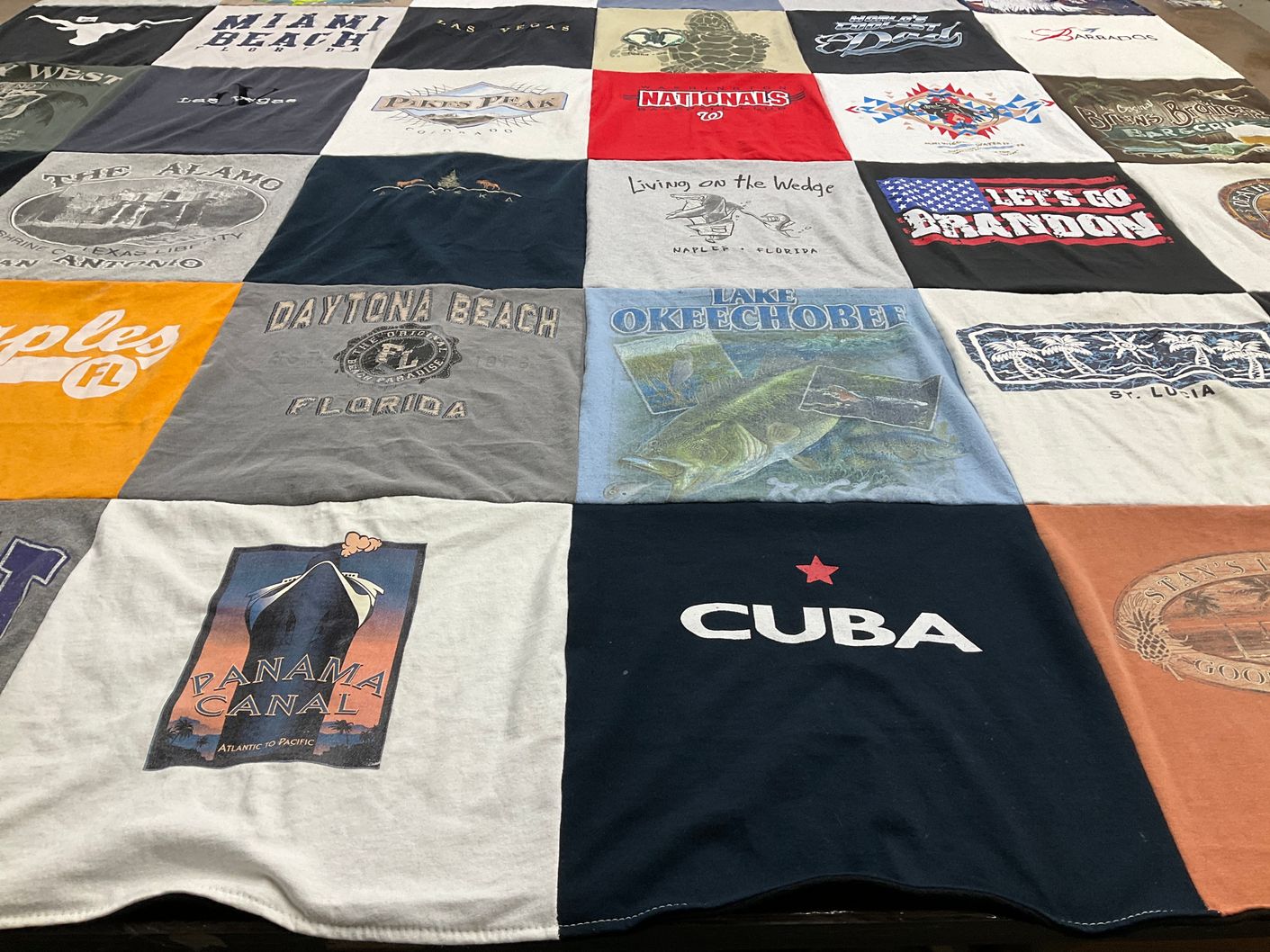 T-shirt quilt with travel, beaches themes by Chris from FL