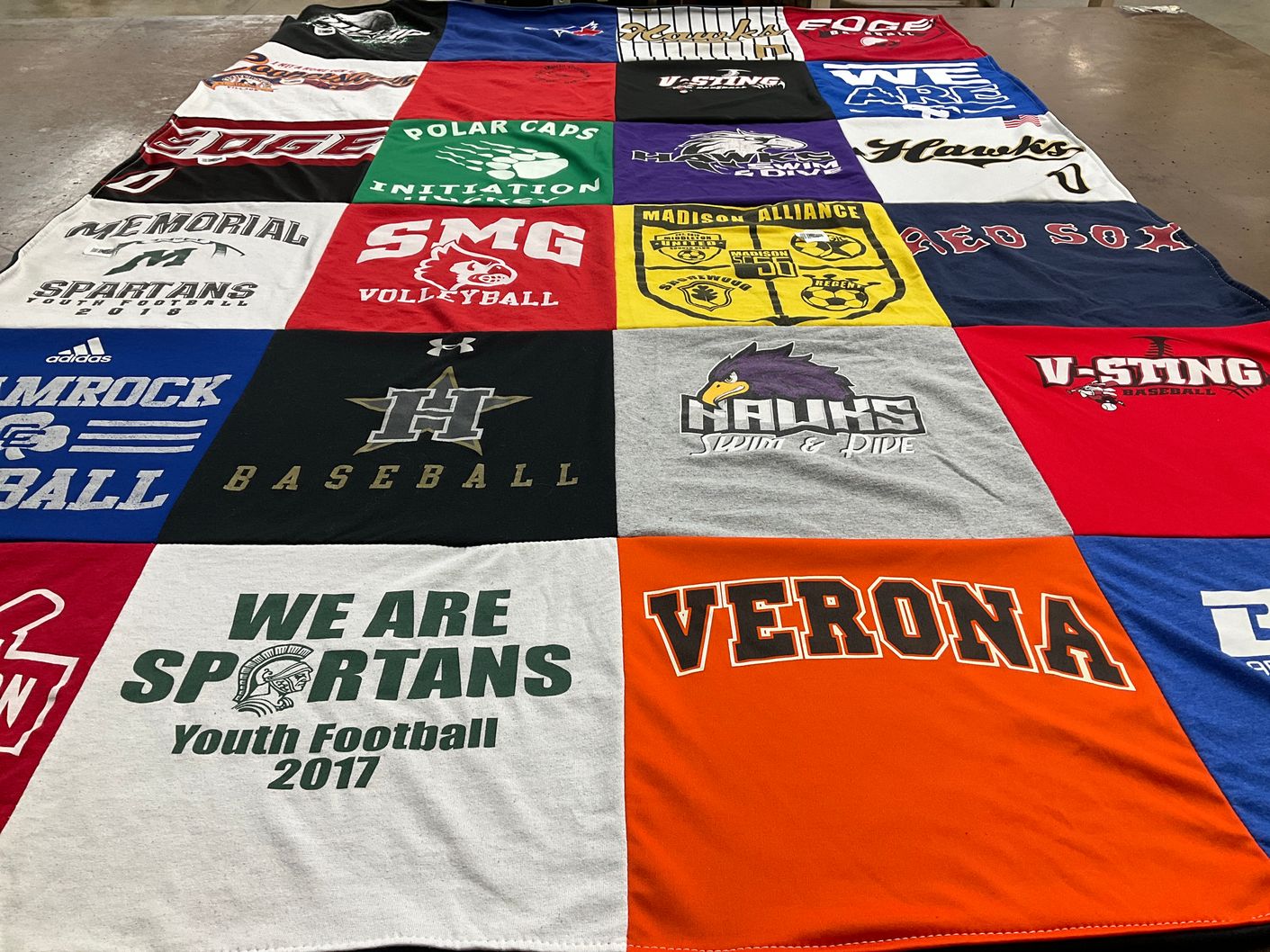 T-shirt quilt featuring spartans football, hawks swim and dive by Michele from MI