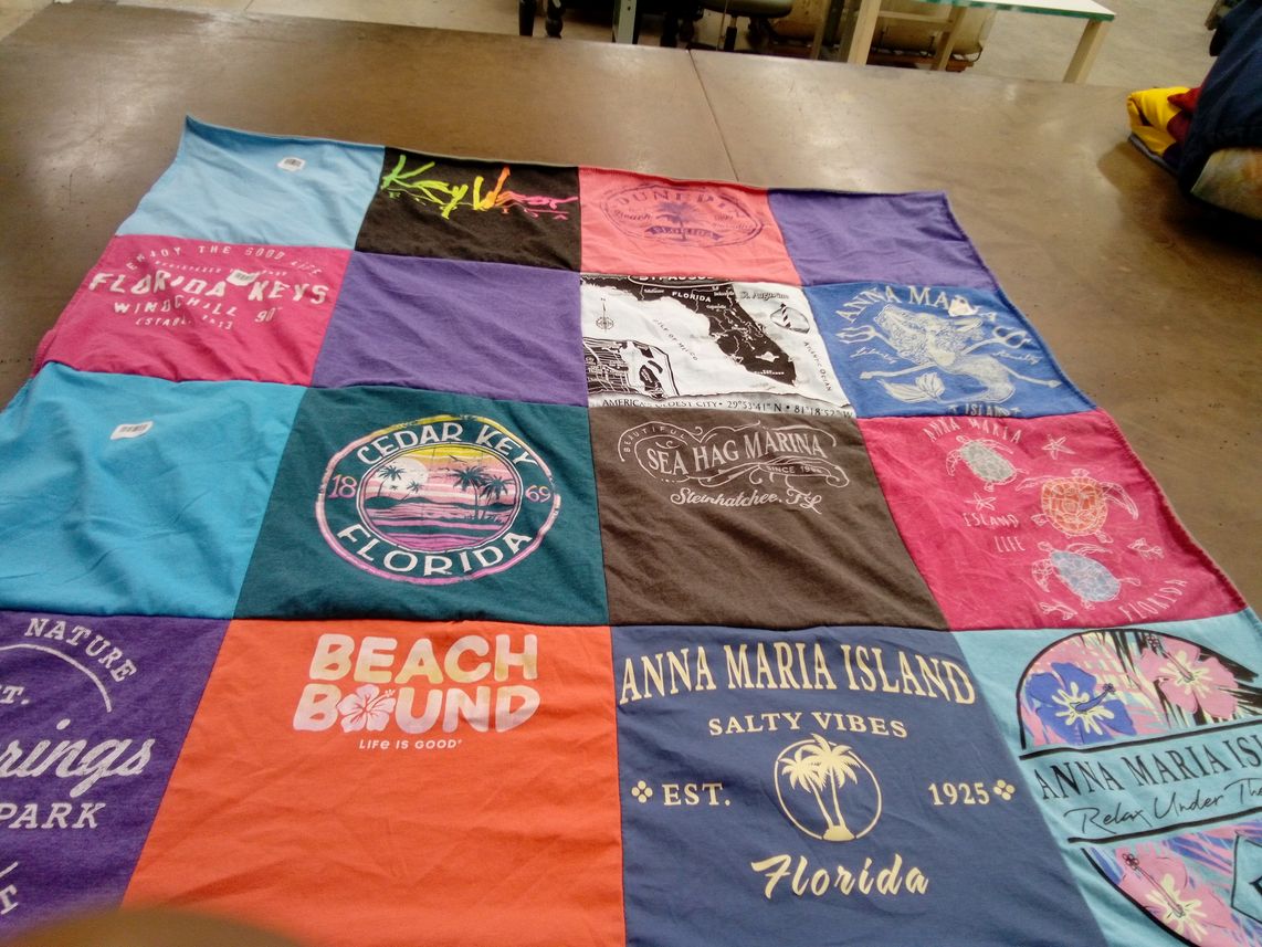 T-shirt quilt with beach, marine life themes by cheryl from FL