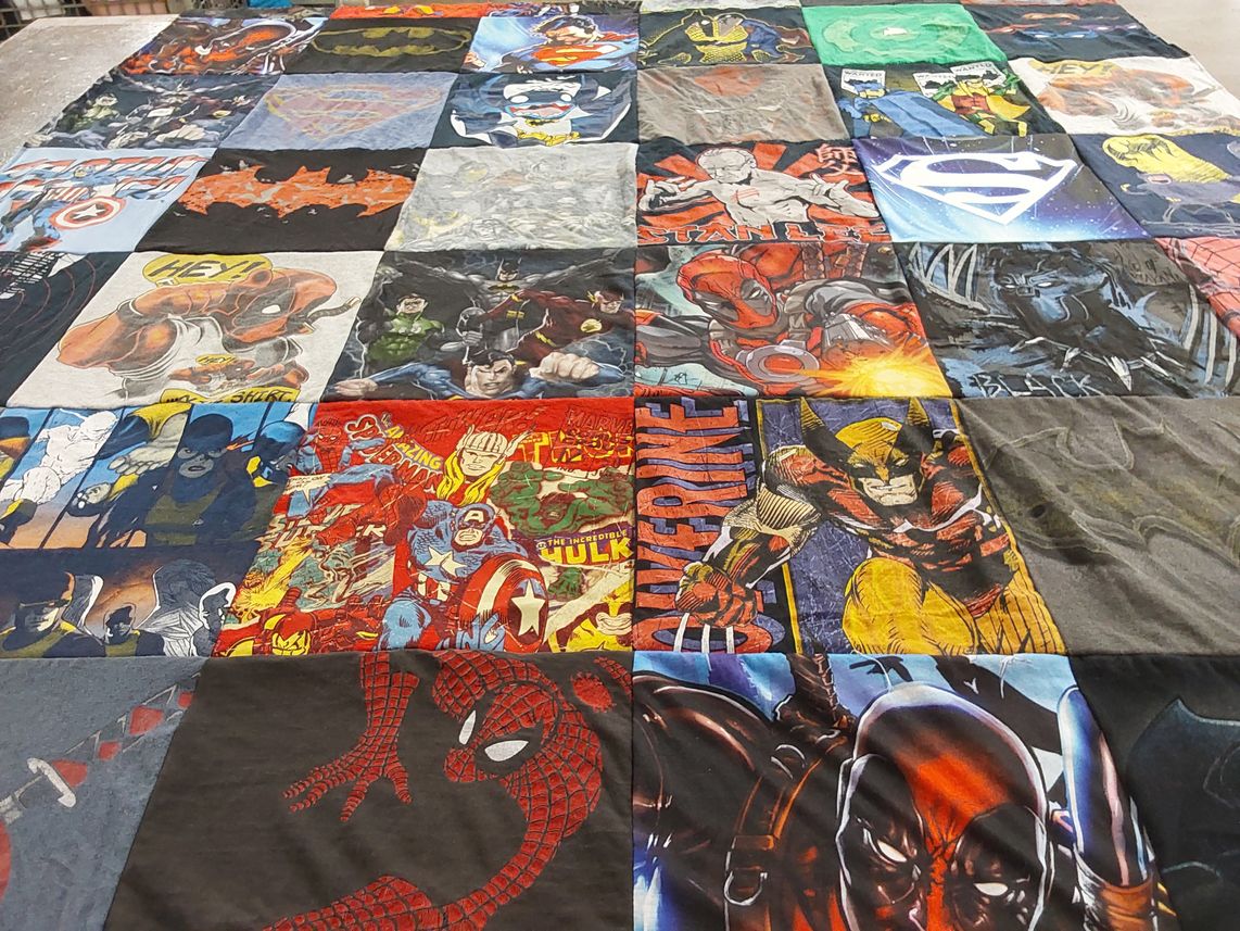 T-shirt quilt with comics, superheroes themes by Monica from TX