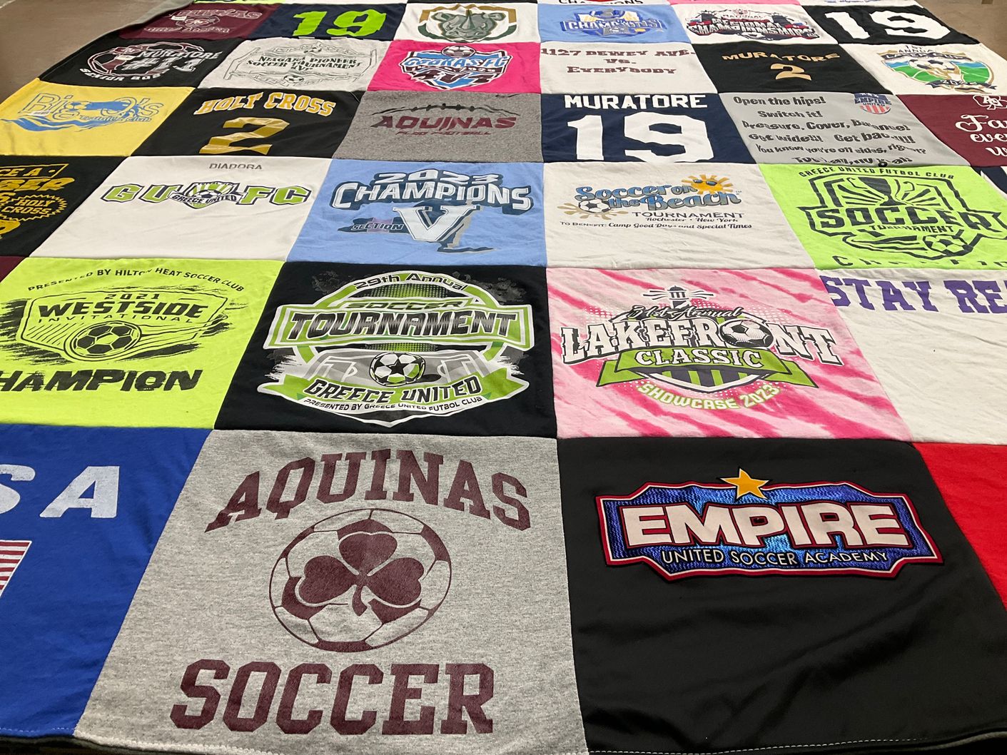 T-shirt quilt from aquinas college, holy cross college by Lisa from NY