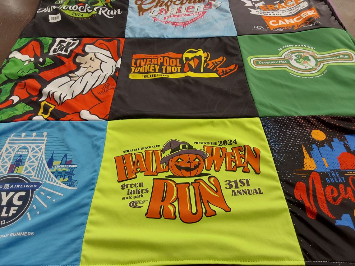 T-shirt quilt with running, events themes by Orla from NY
