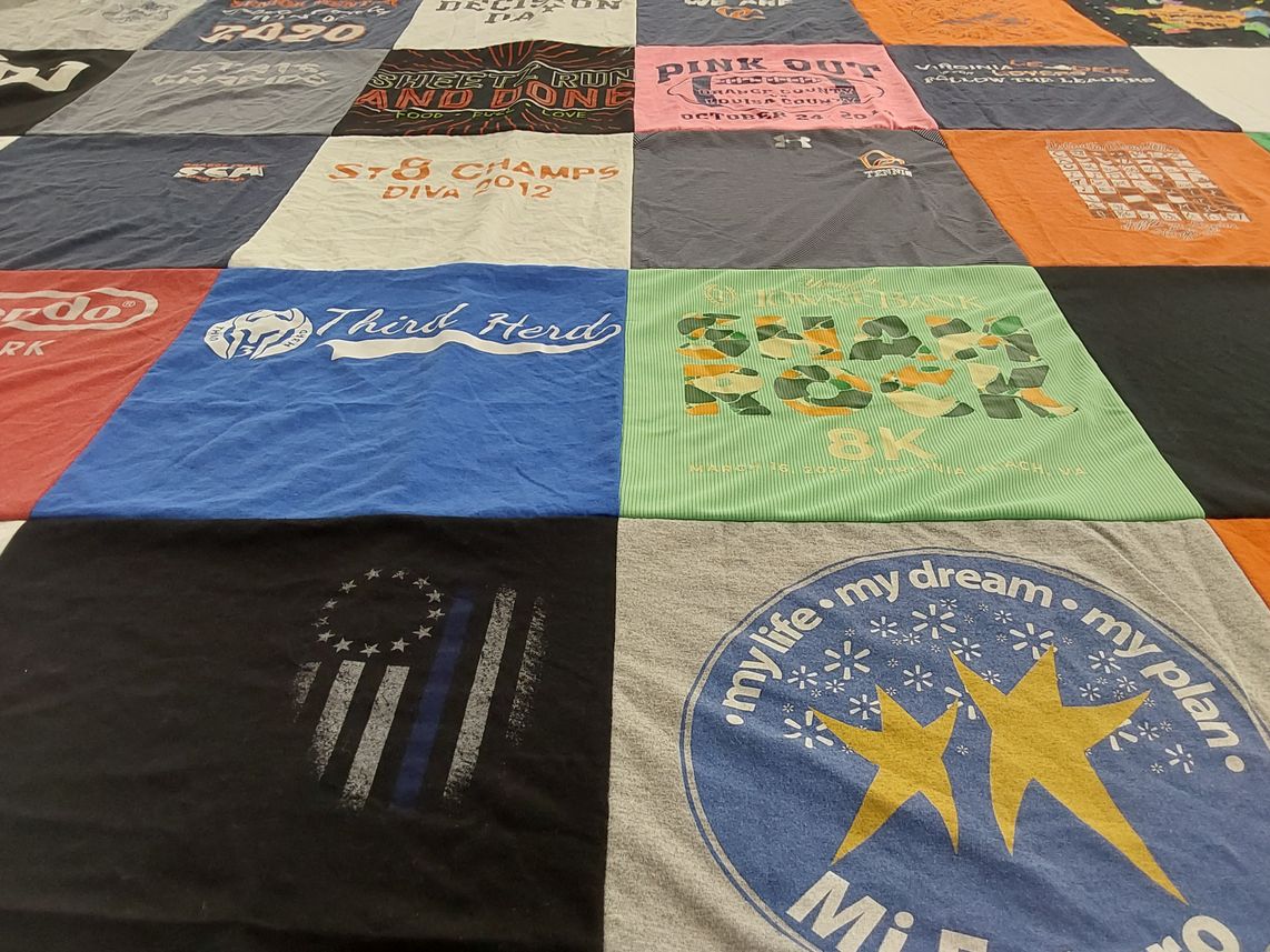T-shirt quilt with running, fundraising themes by Angela from VA