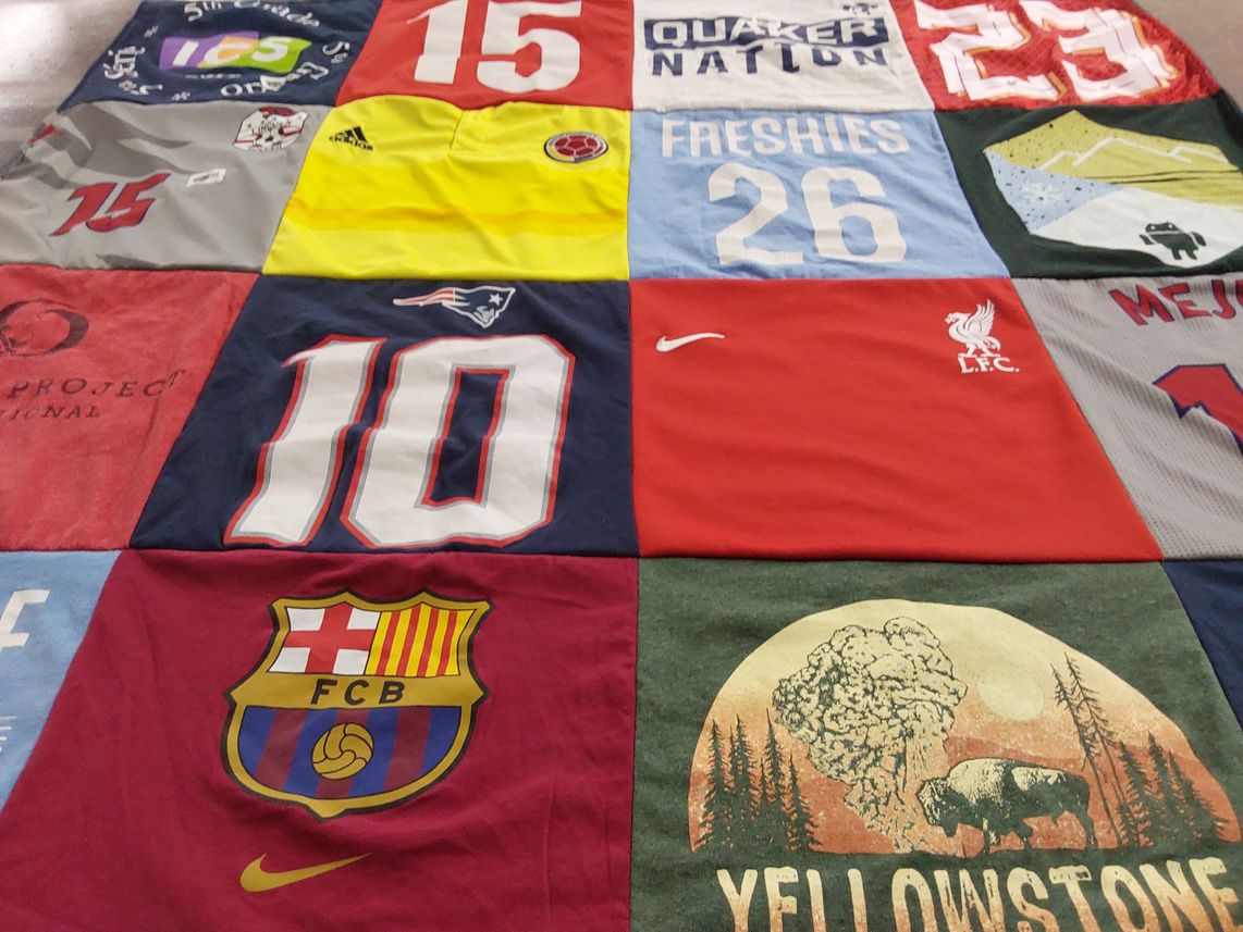 T-shirt quilt featuring liverpool football club, new england patriots by Mariel from RI