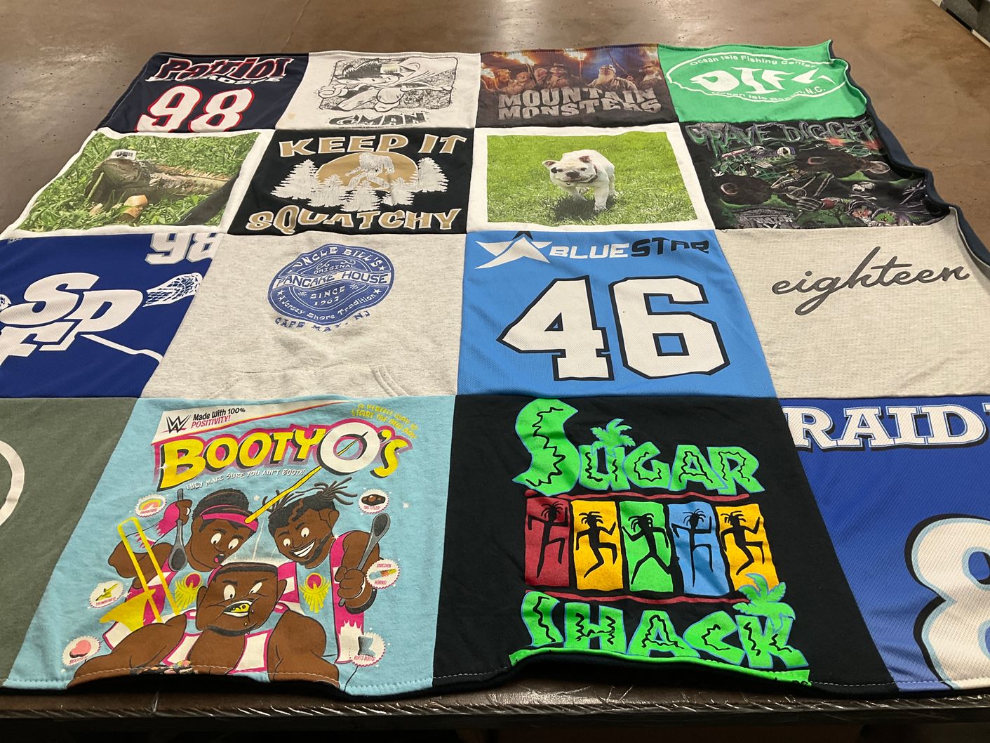 T-shirt quilt with hunting, fishing themes by Deena from NJ