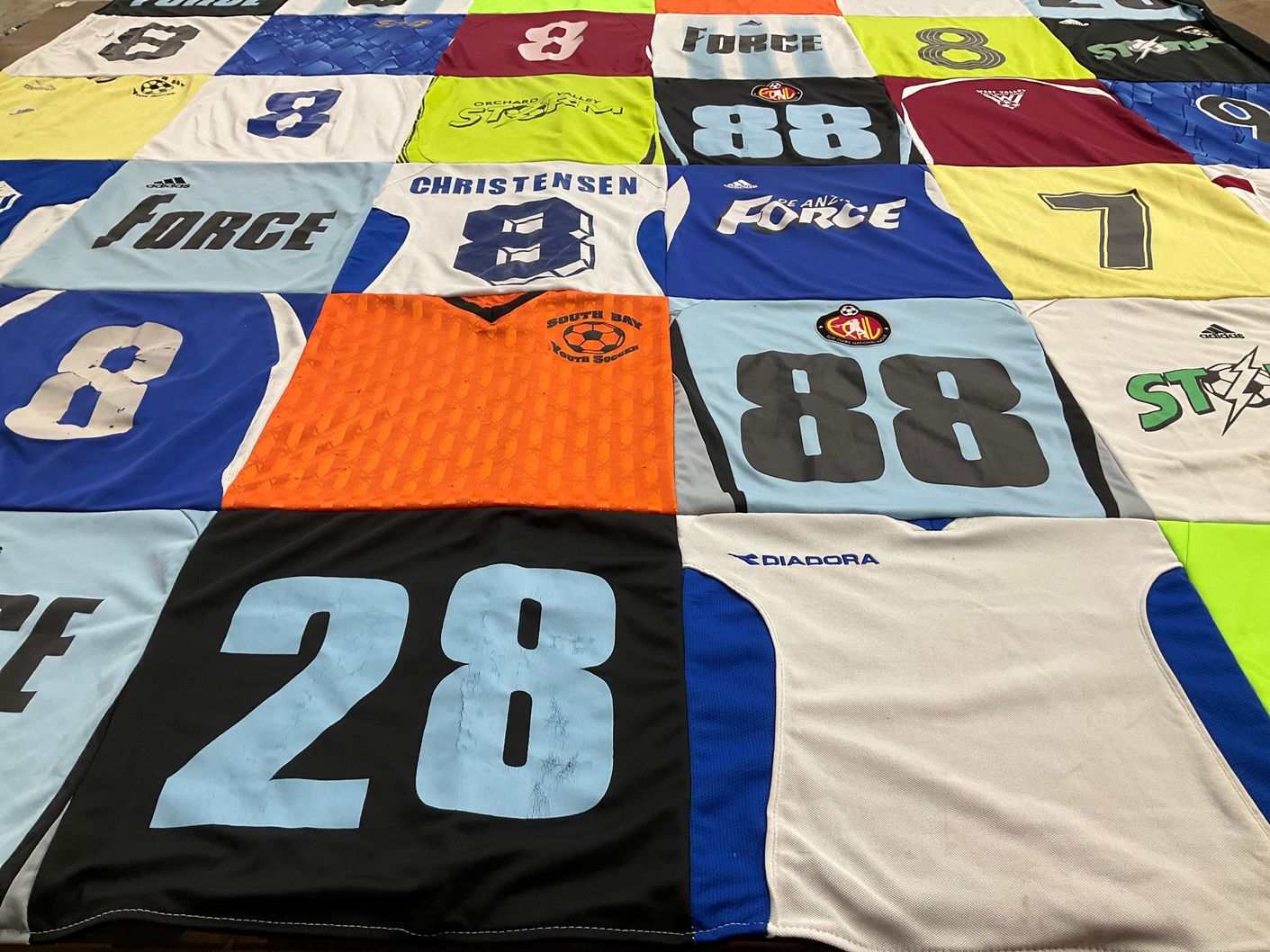 T-shirt quilt with soccer themes by Rachel from NV