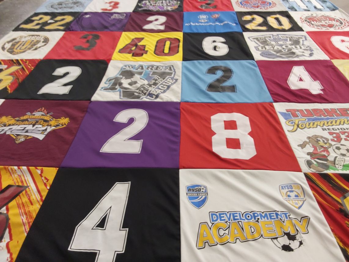 T-shirt quilt with soccer themes by Azad from CA