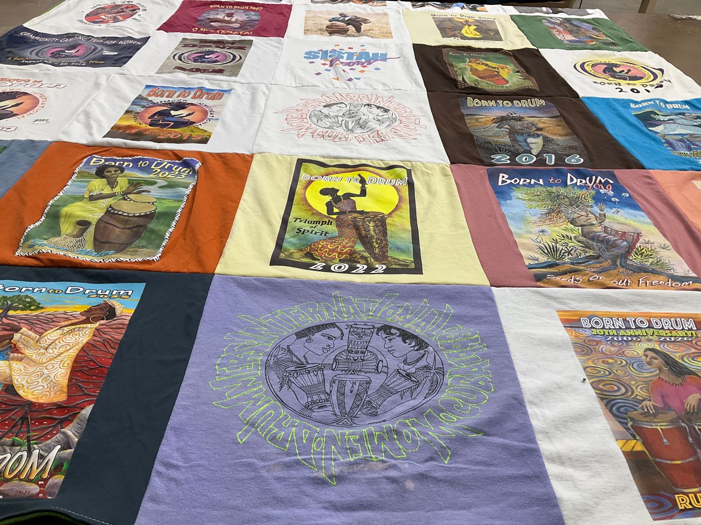 T-shirt quilt with drumming, community events themes by JEAN from CA