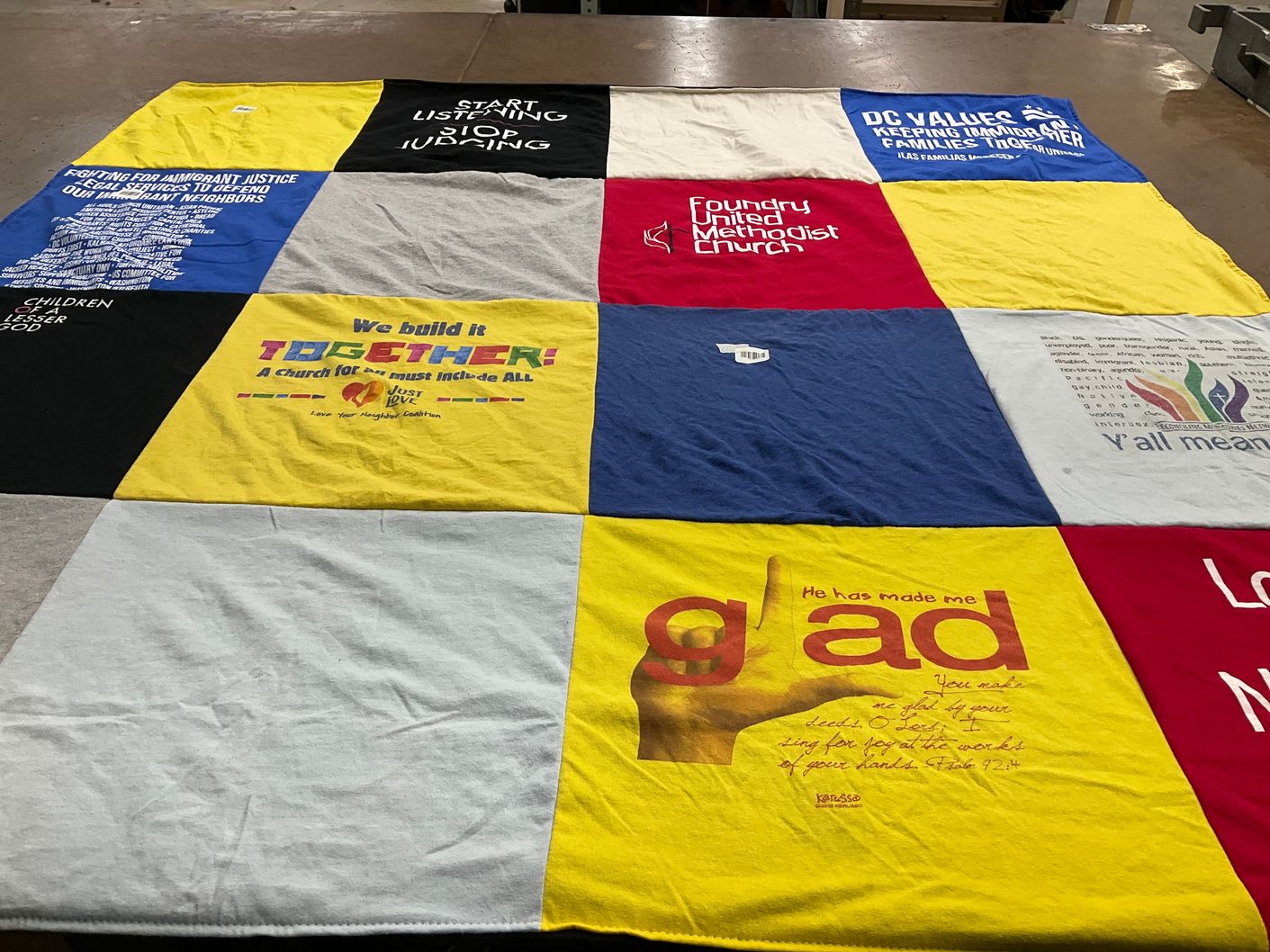 T-shirt quilt with social justice, community service themes by Sarah from MD