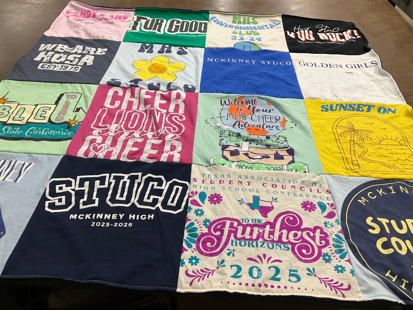 T-shirt quilt from mckinney high school by Gretchen from TX