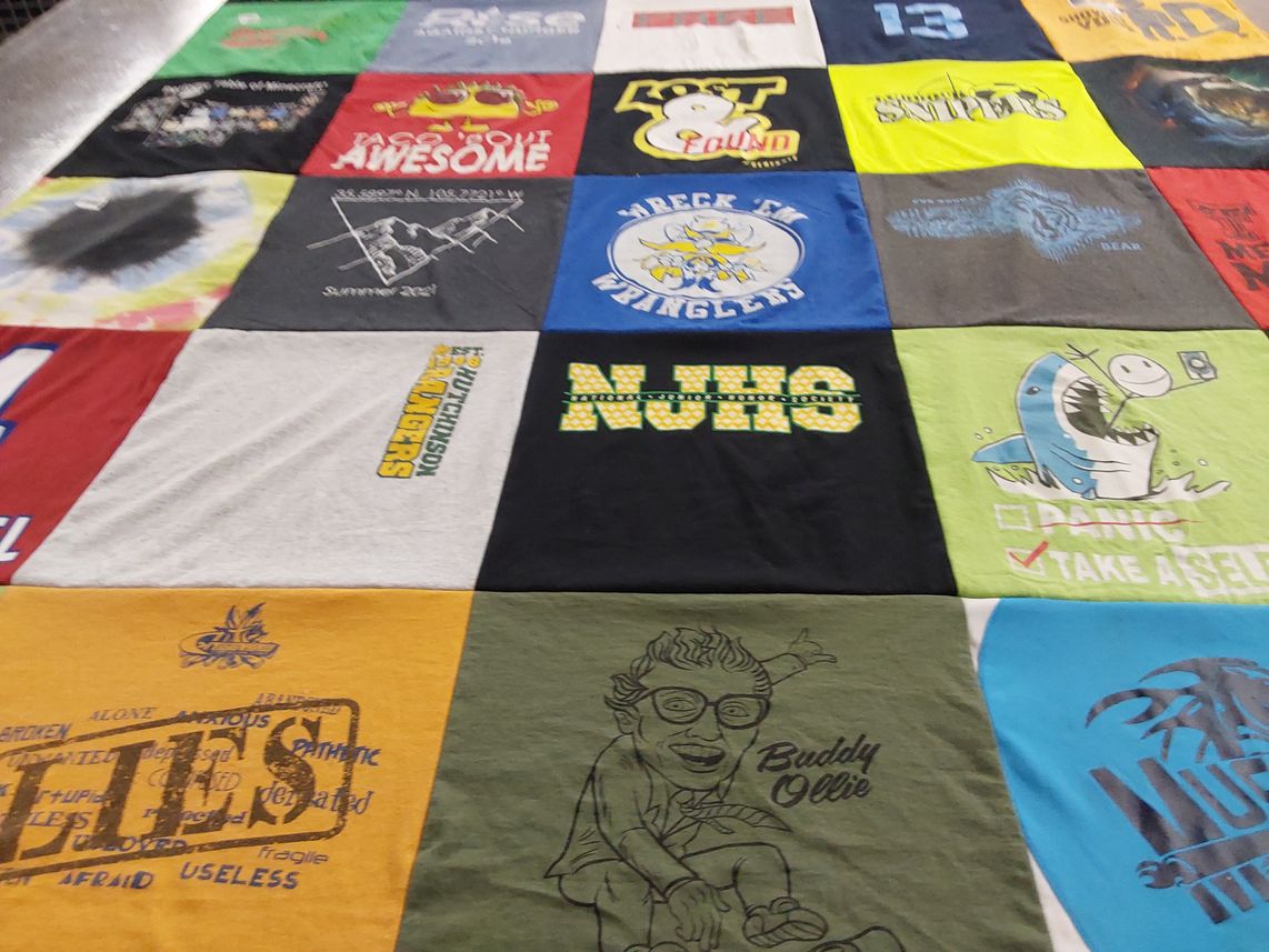 T-shirt quilt featuring wreck em wranglers by Lee from TX