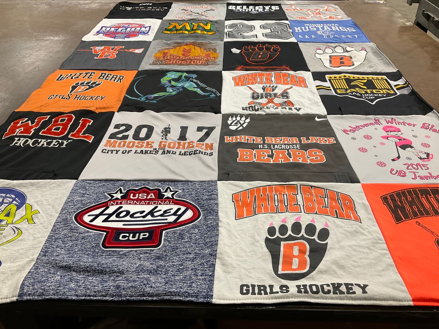 T-shirt quilt featuring white bear girls hockey, white bear lacrosse by Abby from MN