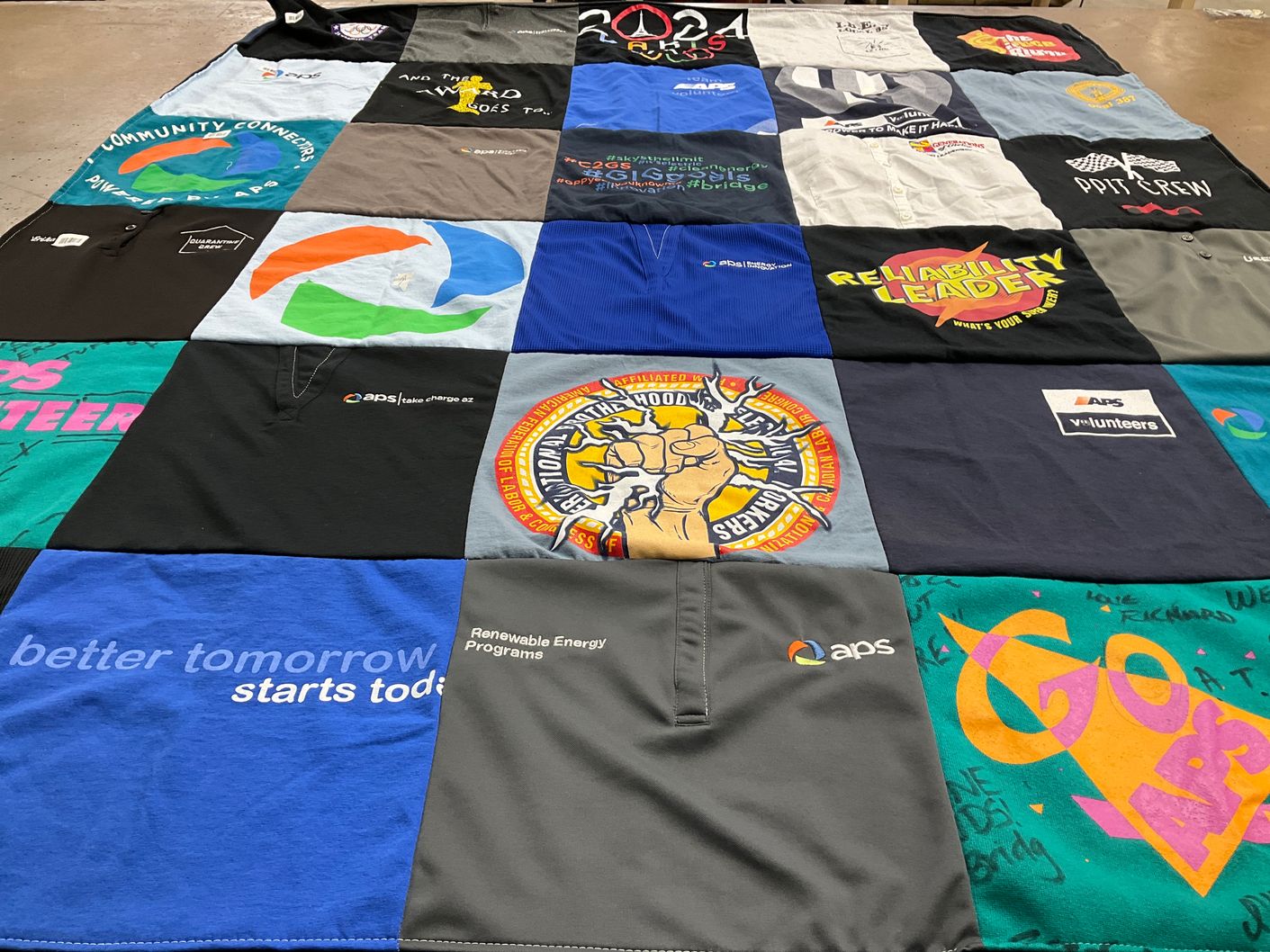 T-shirt quilt with volunteering, community service themes by Erika from AZ