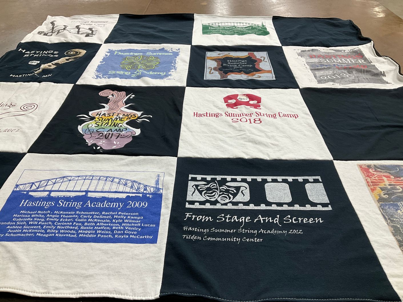 T-shirt quilt with music, string instruments themes by Rachel from MN