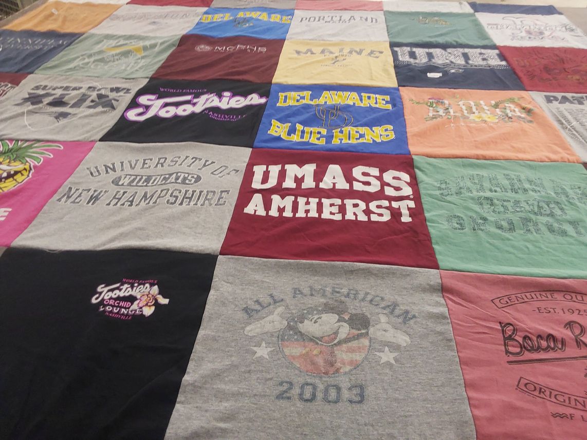 T-shirt quilt from university of new hampshire, university of massachusetts amherst by Paul from NH