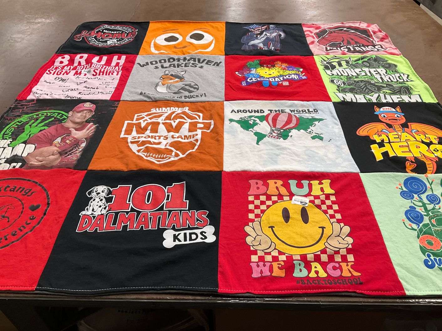 T-shirt quilt with sports, celebration themes by Jenny from IL