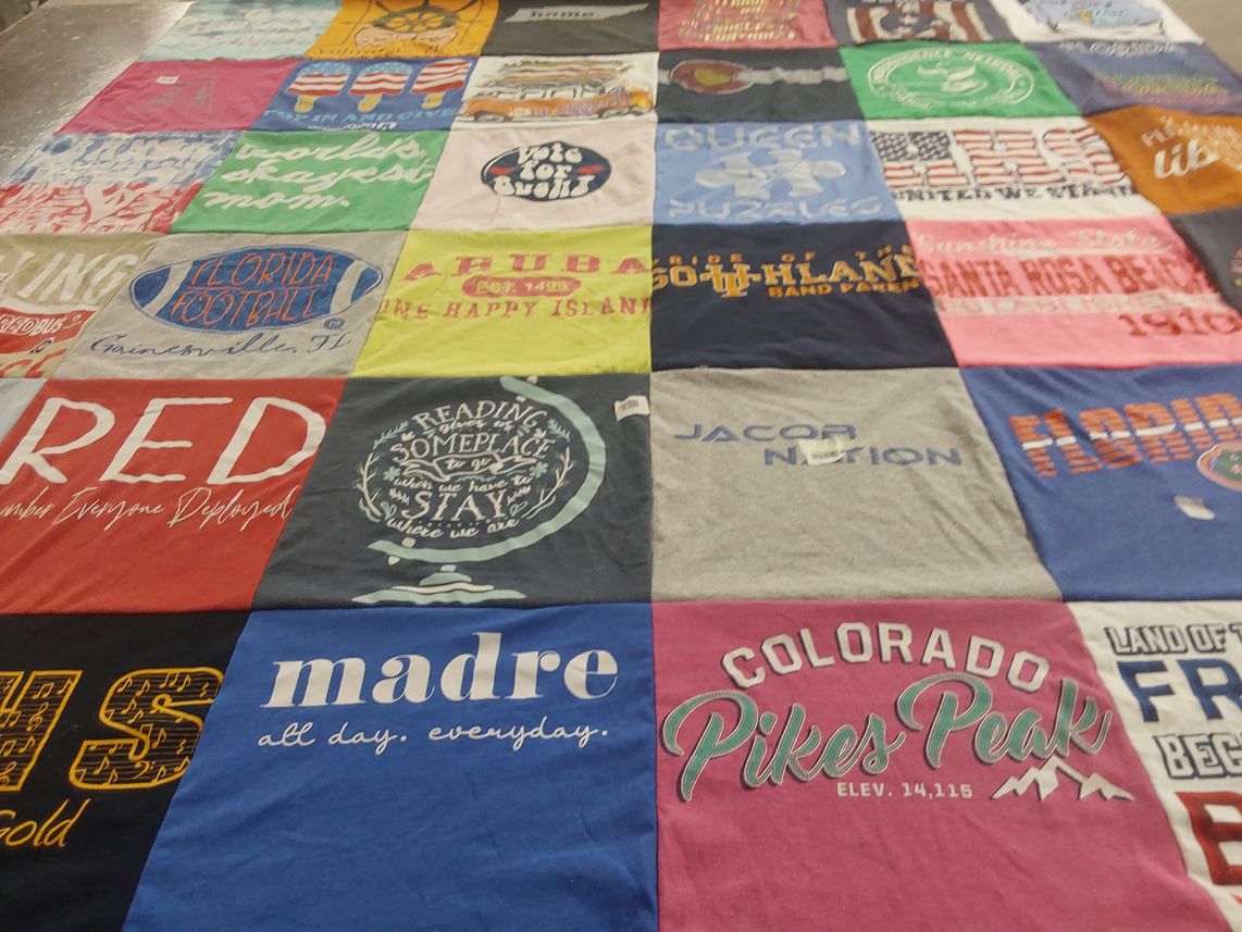 T-shirt quilt with travel, education themes by Melanie from FL