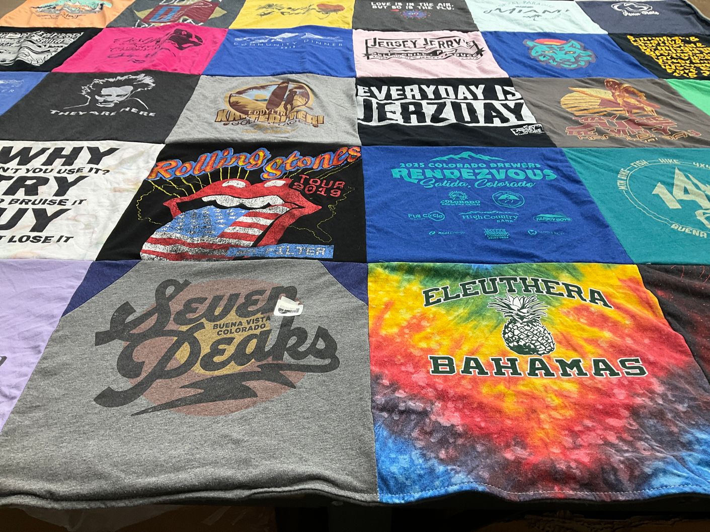 T-shirt quilt with music, travel themes by Sharon from CO