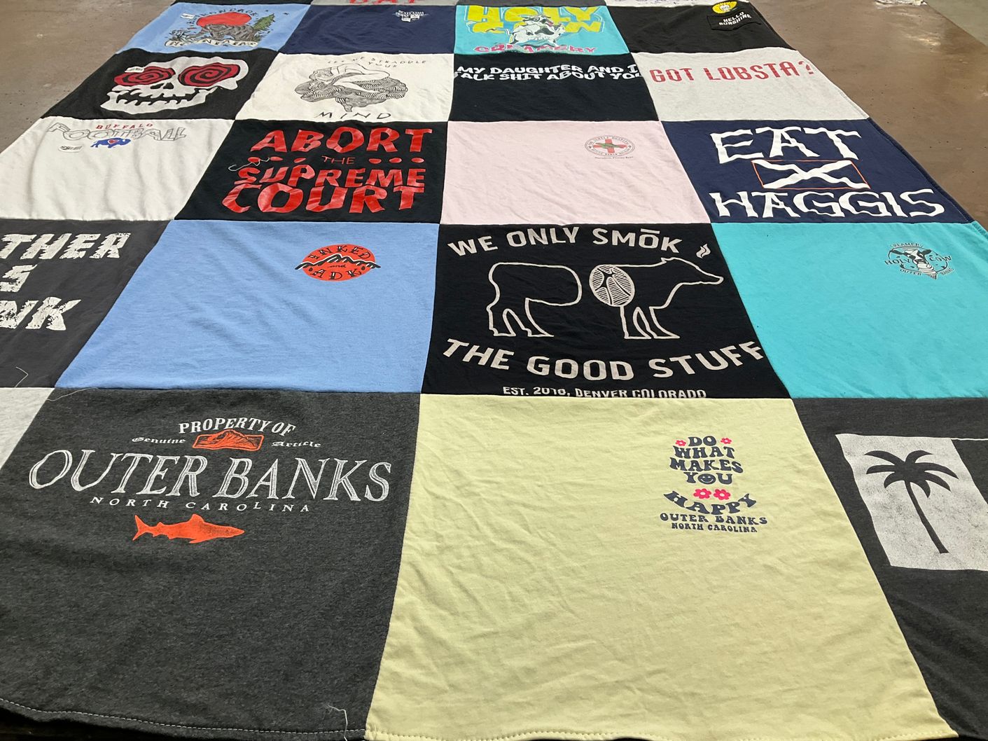T-shirt quilt with cooking, travel themes by Caitlin from NY