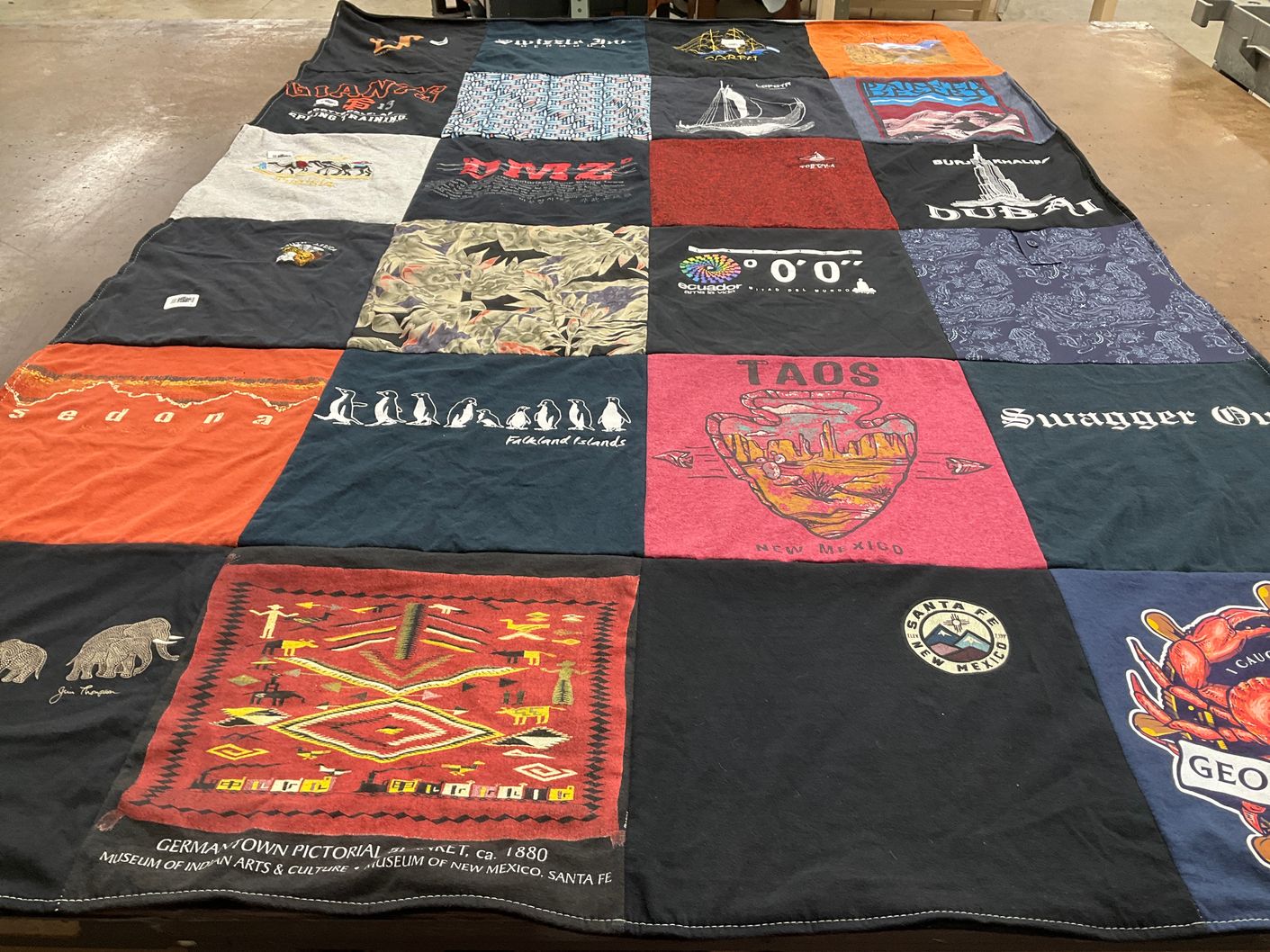T-shirt quilt with travel, art themes by Korrin from WA