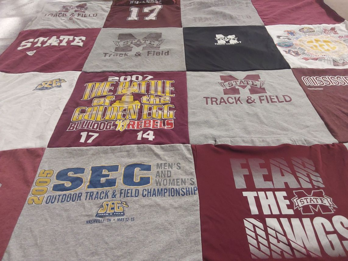 T-shirt quilt featuring mississippi state university track and field by Annie from AZ