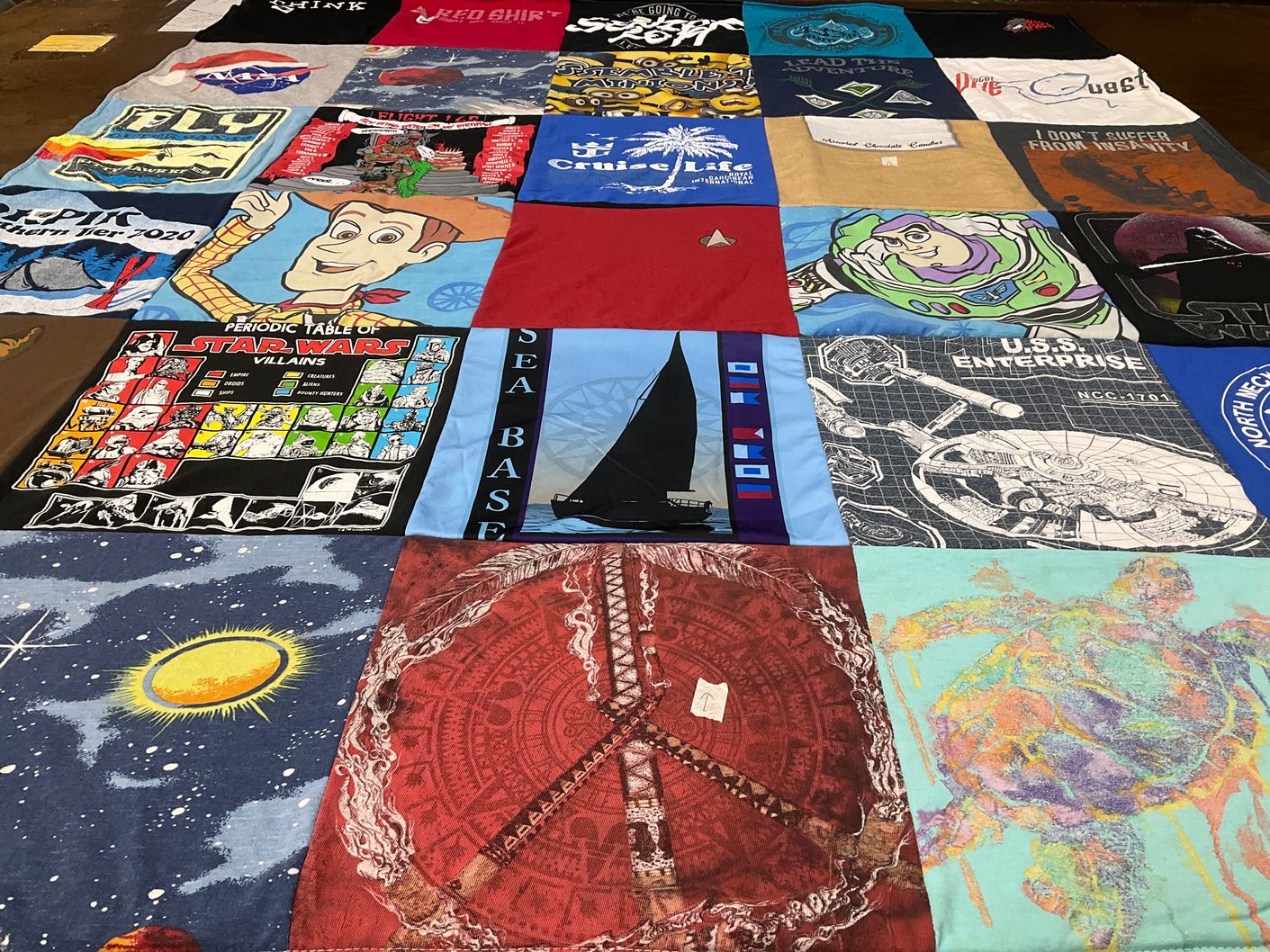 T-shirt quilt with space, science fiction themes by Tatia from NC