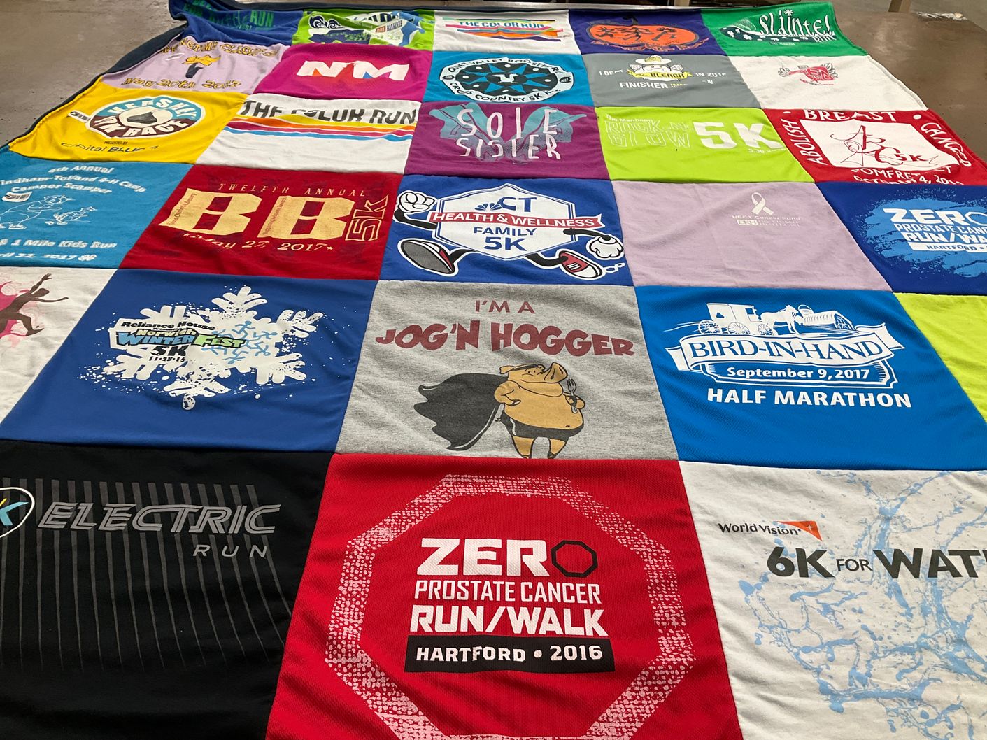 T-shirt quilt with running, charity events themes by Karin from CT